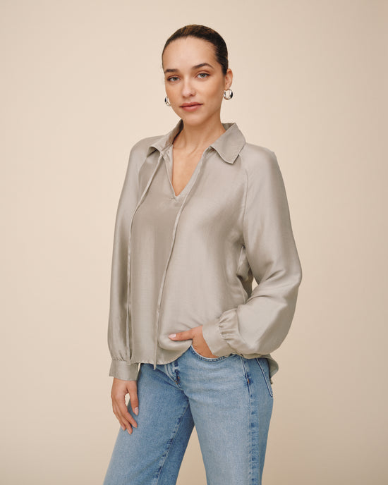 Opens /collections/tops