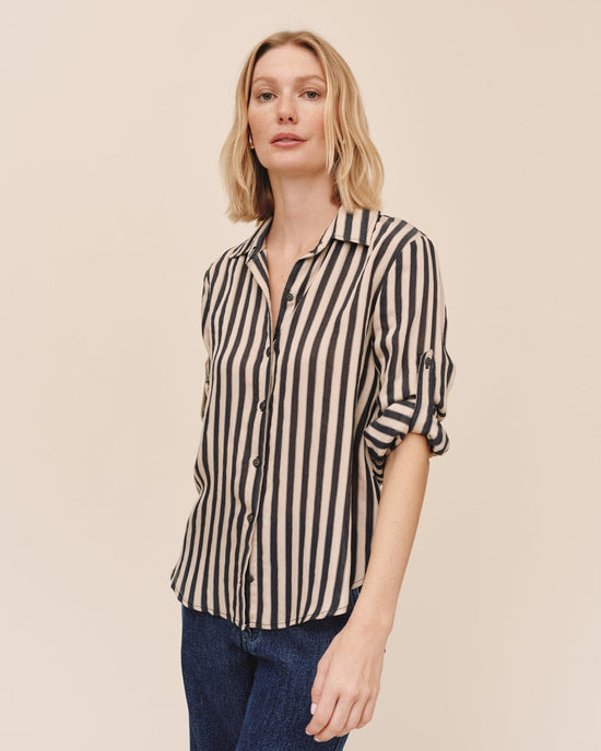 Opens /collections/tops